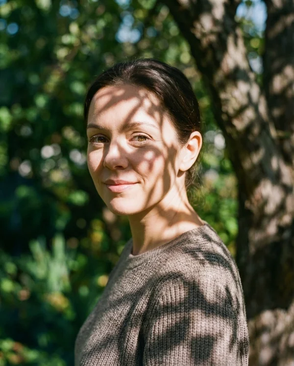 Portrait with harsh direct sunlight creating uneven shadows
